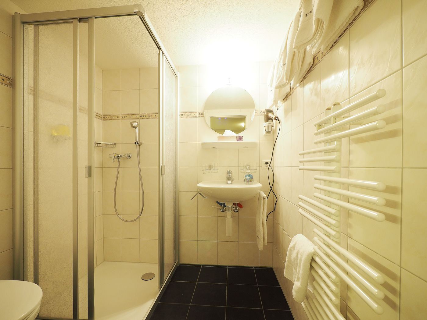 Bathroom with shower at Esther's Guesthouse